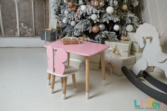 Рожевий прямокутний стіл і стільчик дитячий метелик з білим сидінням. Рожевий дитячий столик